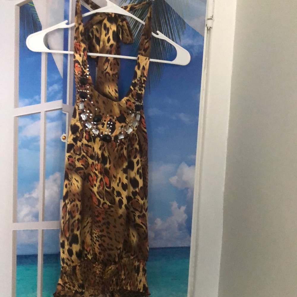 Voice, medium animal print, halter back top with gems.
